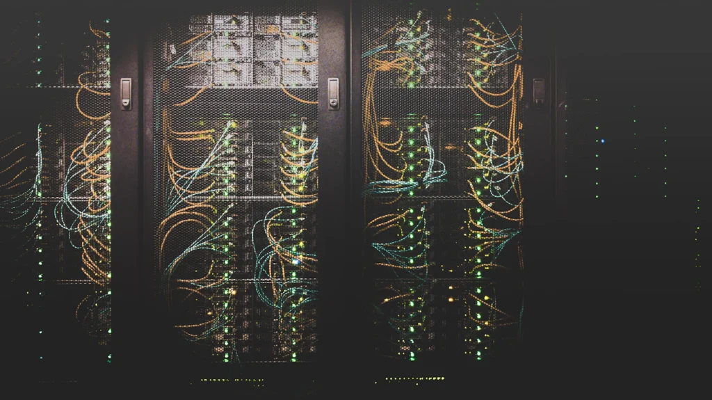 Server racks and network cables in a server room